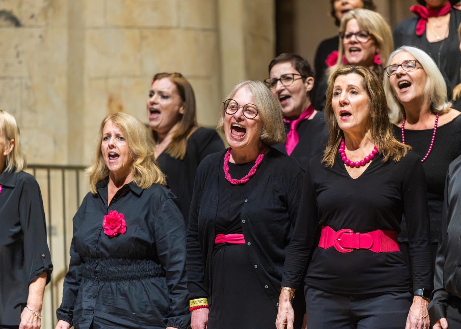 A choir singing expressively in St Albans Cathedral