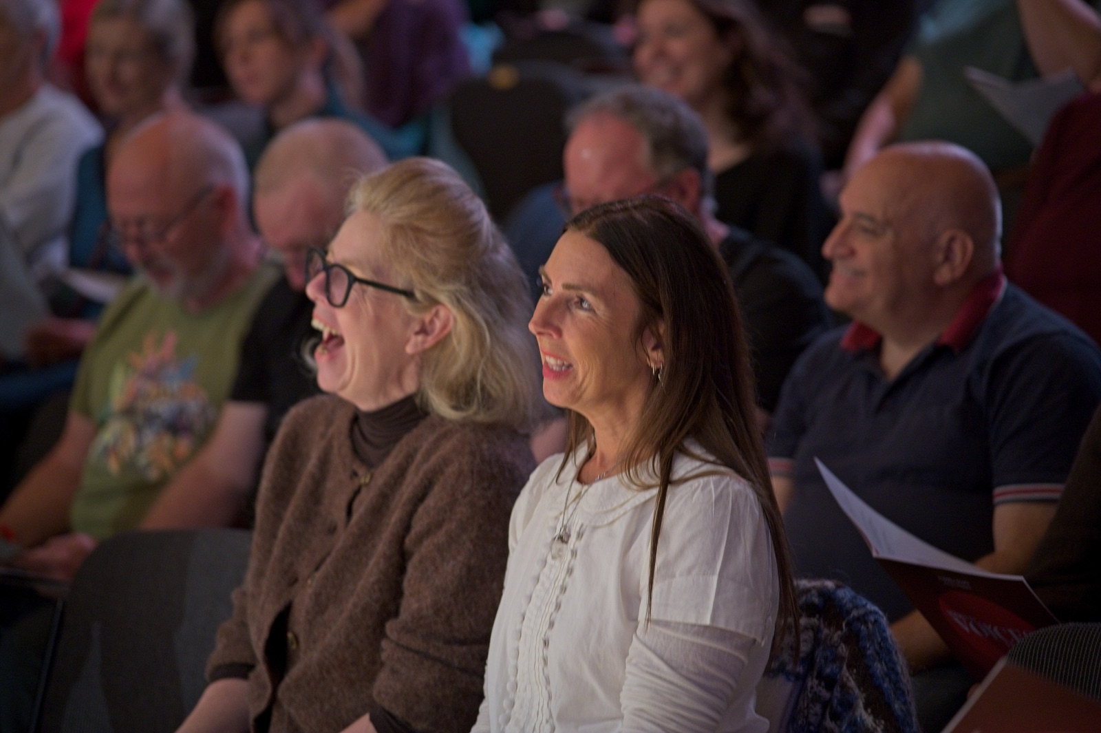 Workshop participants enjoying a shared moment of laughter